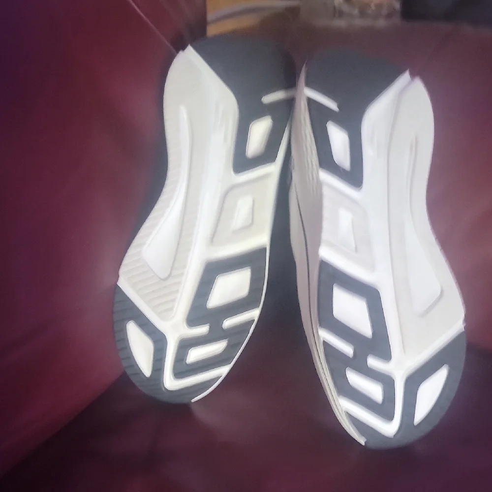 Skechers White and Black Max Cushion Slip-Ons